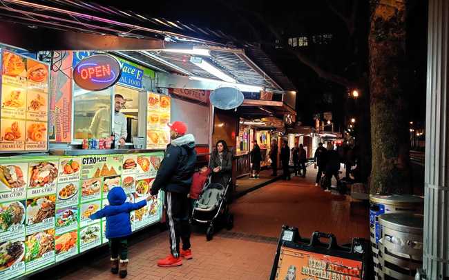 The 5th avenue food cart pod at night